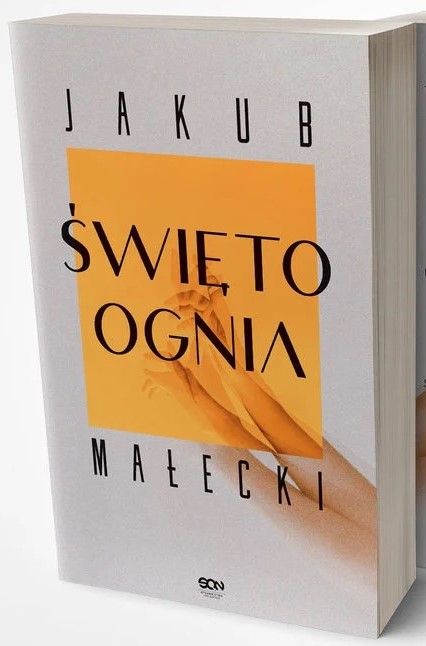 grafika przedstawia książkę „Święto ognia”
